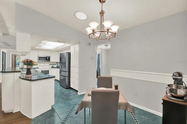 a view of a kitchen and a sink