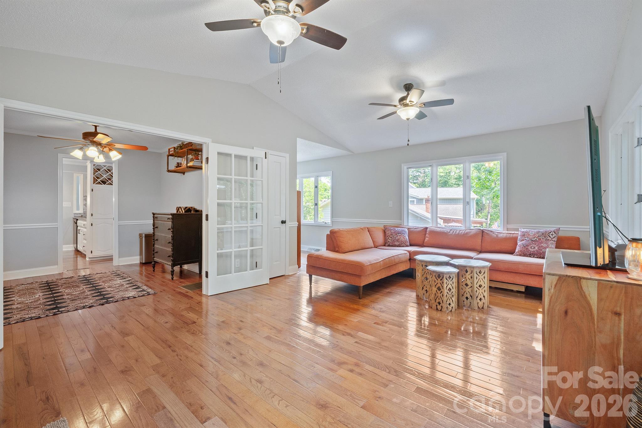 19017 Kailua Circle Tega Cay, SC 29708 - Photo 18 of 46 a living room with furniture and a large window