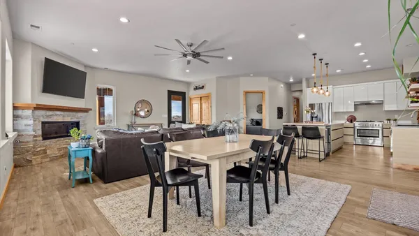 a view of a dining room with furniture