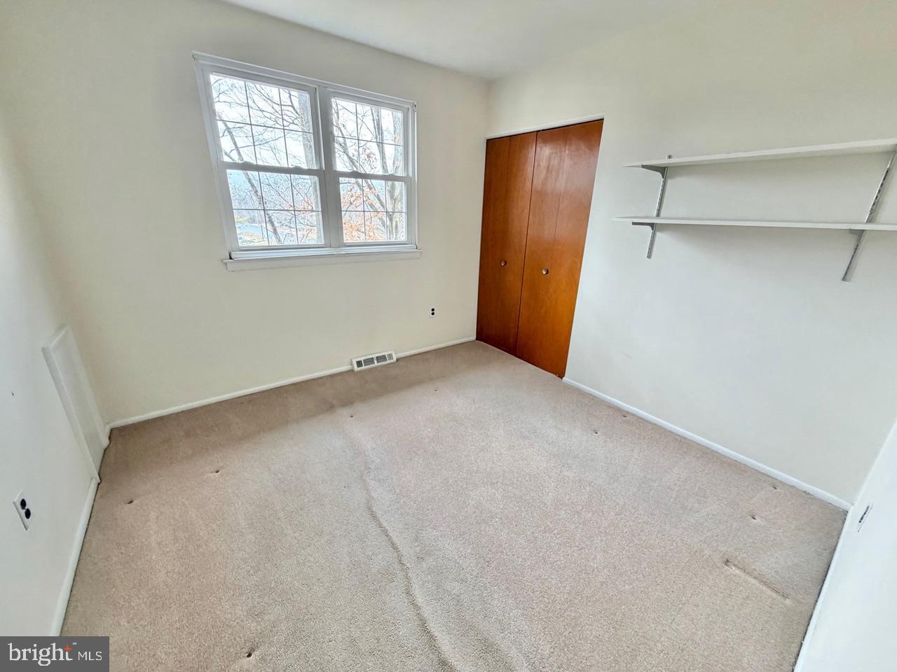 302 Provincetown Road Cherry Hill, NJ 08034 - Photo 16 of 30 an empty room with windows and closet