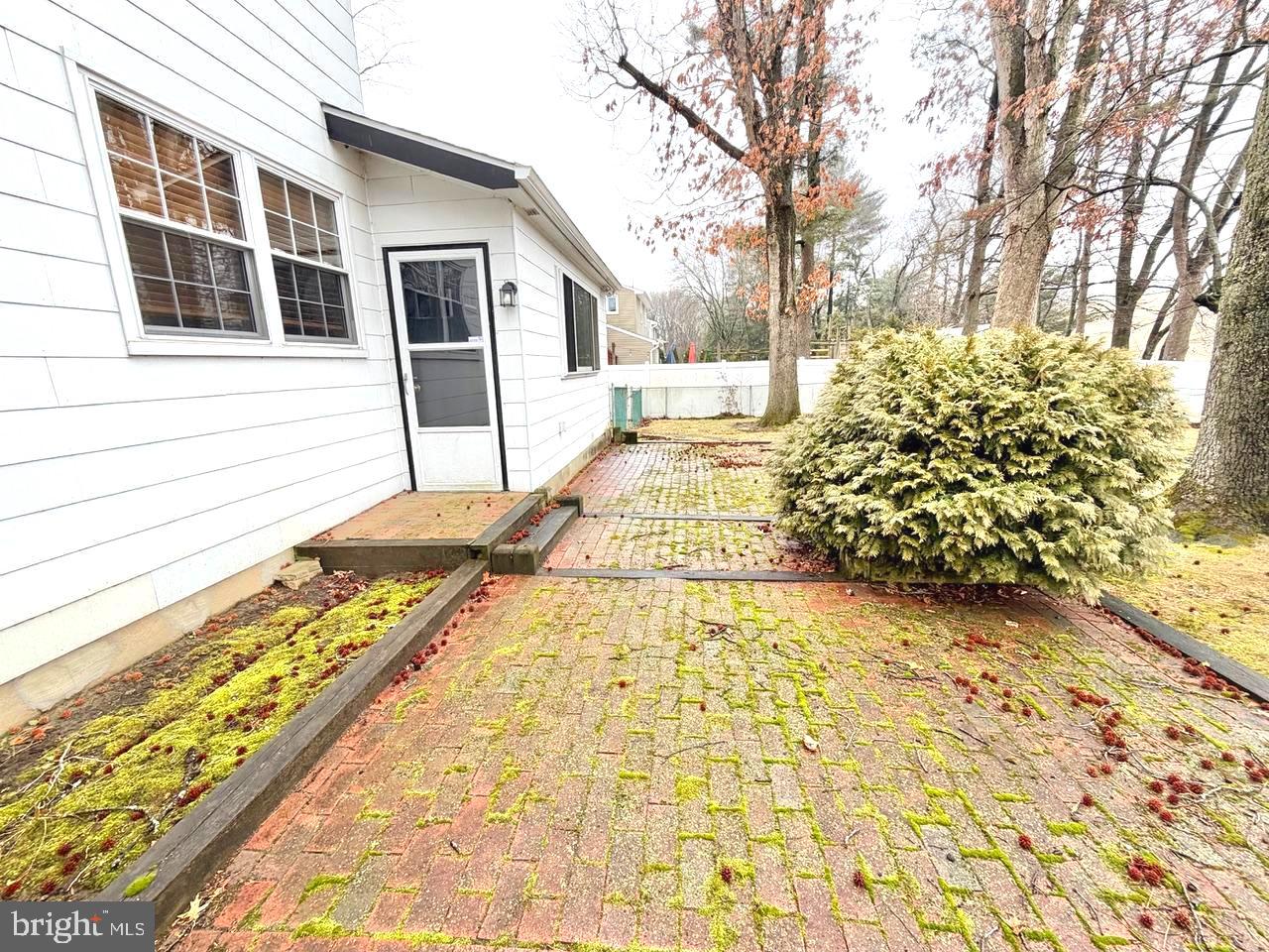 302 Provincetown Road Cherry Hill, NJ 08034 - Photo 23 of 30 a view of a pathway with a yard