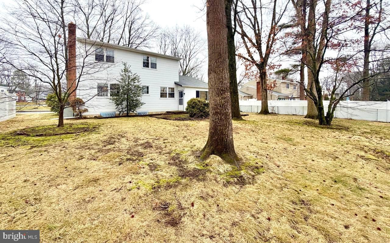 302 Provincetown Road Cherry Hill, NJ 08034 - Photo 25 of 30 a white house that has a tree in front of it