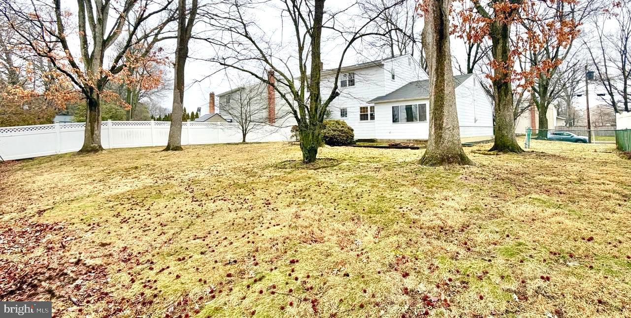 302 Provincetown Road Cherry Hill, NJ 08034 - Photo 27 of 30 a view of a yard with a large tree