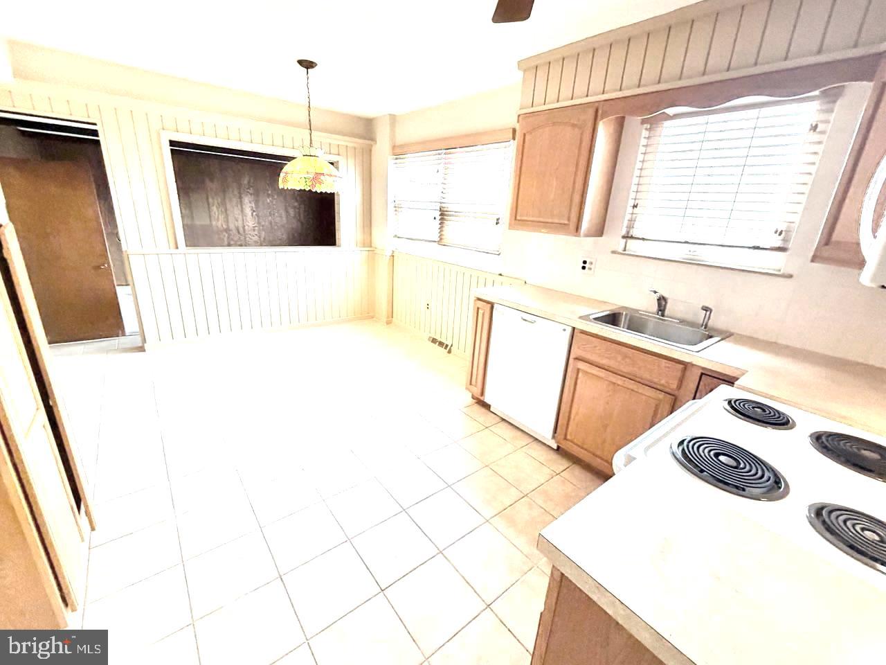 302 Provincetown Road Cherry Hill, NJ 08034 - Photo 4 of 30 a bathroom with a sink a vanity and a bathtub