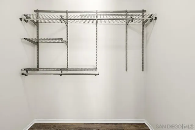 a view of a room with racks on the wall