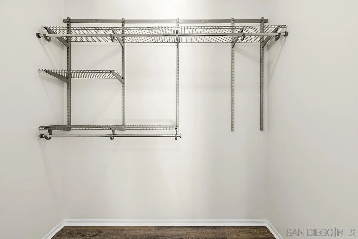 2511 Via Sorbete Carlsbad, CA 92010 - Photo 16 of 37 a view of a room with racks on the wall
