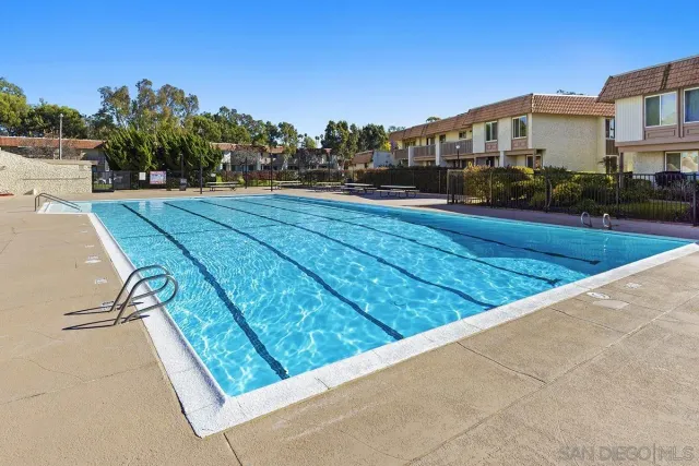 a view of swimming pool with outdoor space and seating