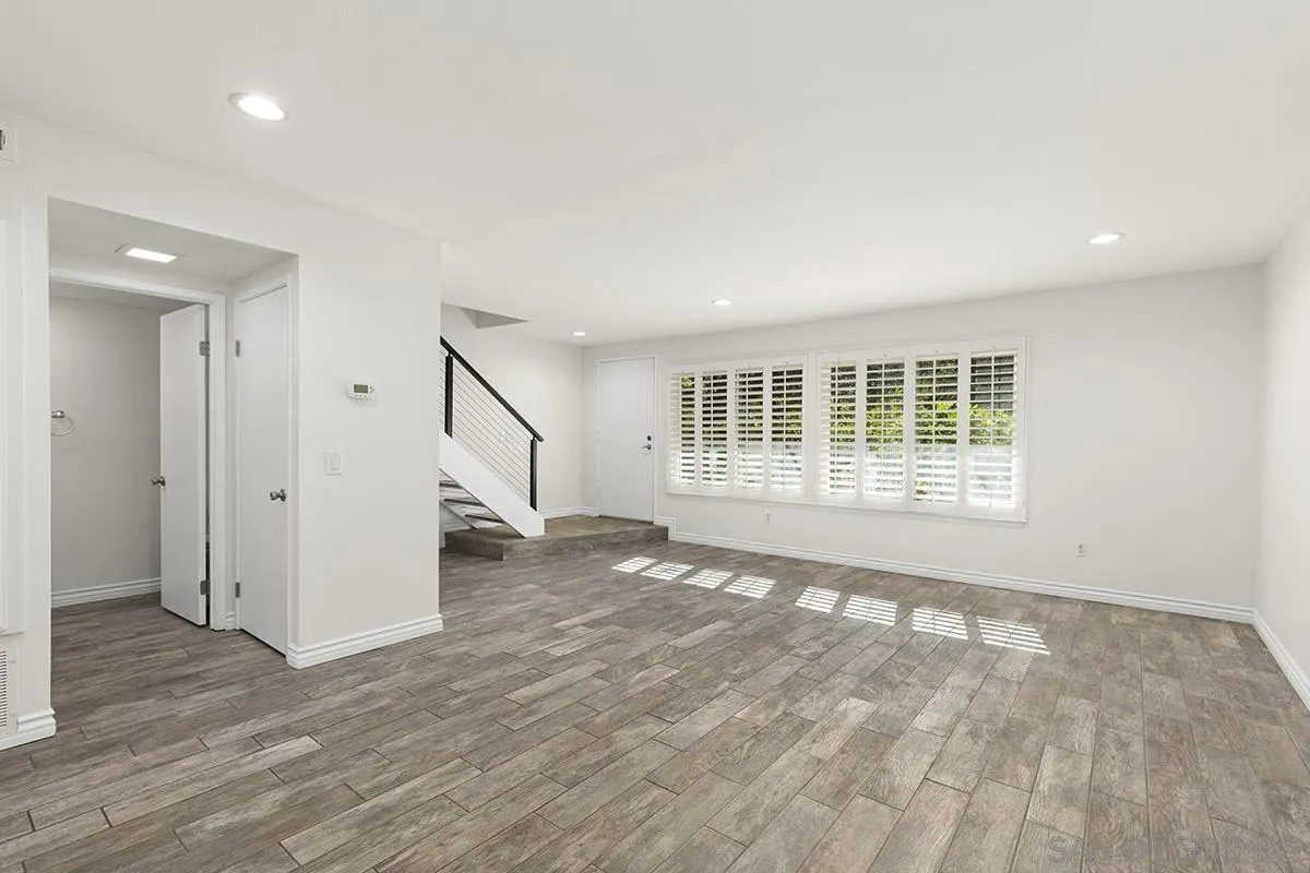 2511 Via Sorbete Carlsbad, CA 92010 - Photo 6 of 37 a view of an empty room with wooden floor and a window