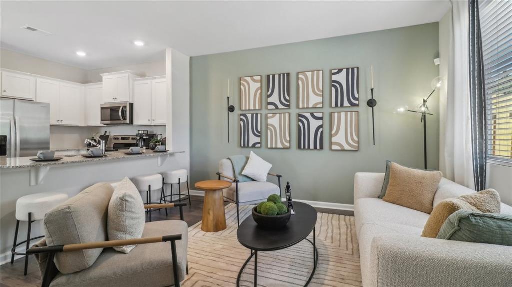 2098 Moss Hill Road Stone Mountain, GA 30083 - Photo 16 of 40 a living room with furniture and a large window