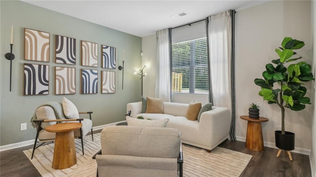 2098 Moss Hill Road Stone Mountain, GA 30083 - Photo 19 of 40 a bedroom with furniture and a window