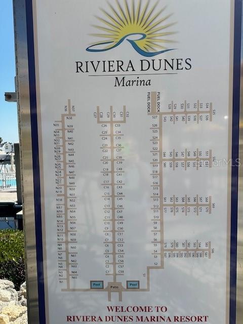 101 Riviera Dunes Way, Unit S 34 Palmetto, FL 34221 - Photo 4 of 4 a close up of a sign