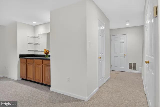 a view of a hallway with closet