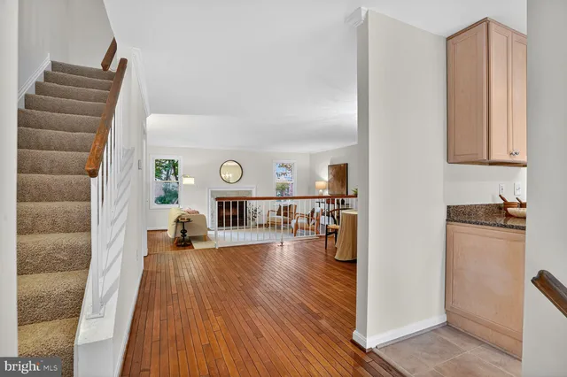 a room with furniture and a wooden floor