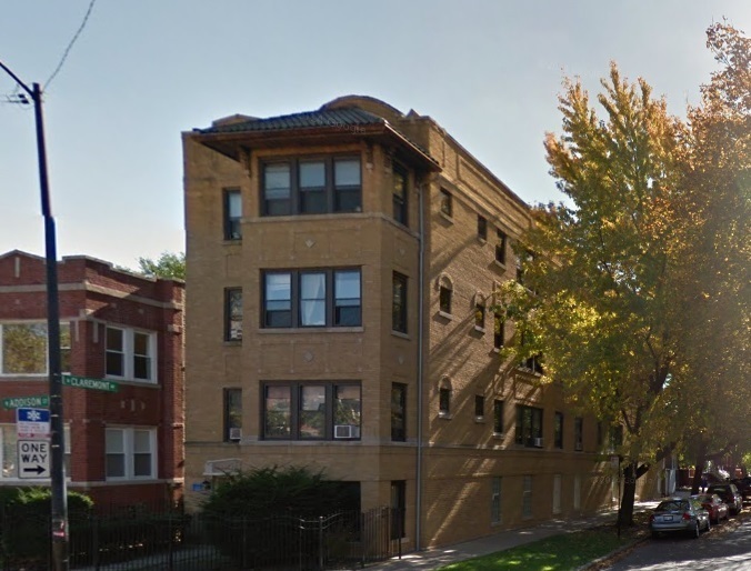 2325 West Addison Street, Unit 3 Chicago, IL 60618 - Photo 1 of 12 a front view of a building with lot of trees