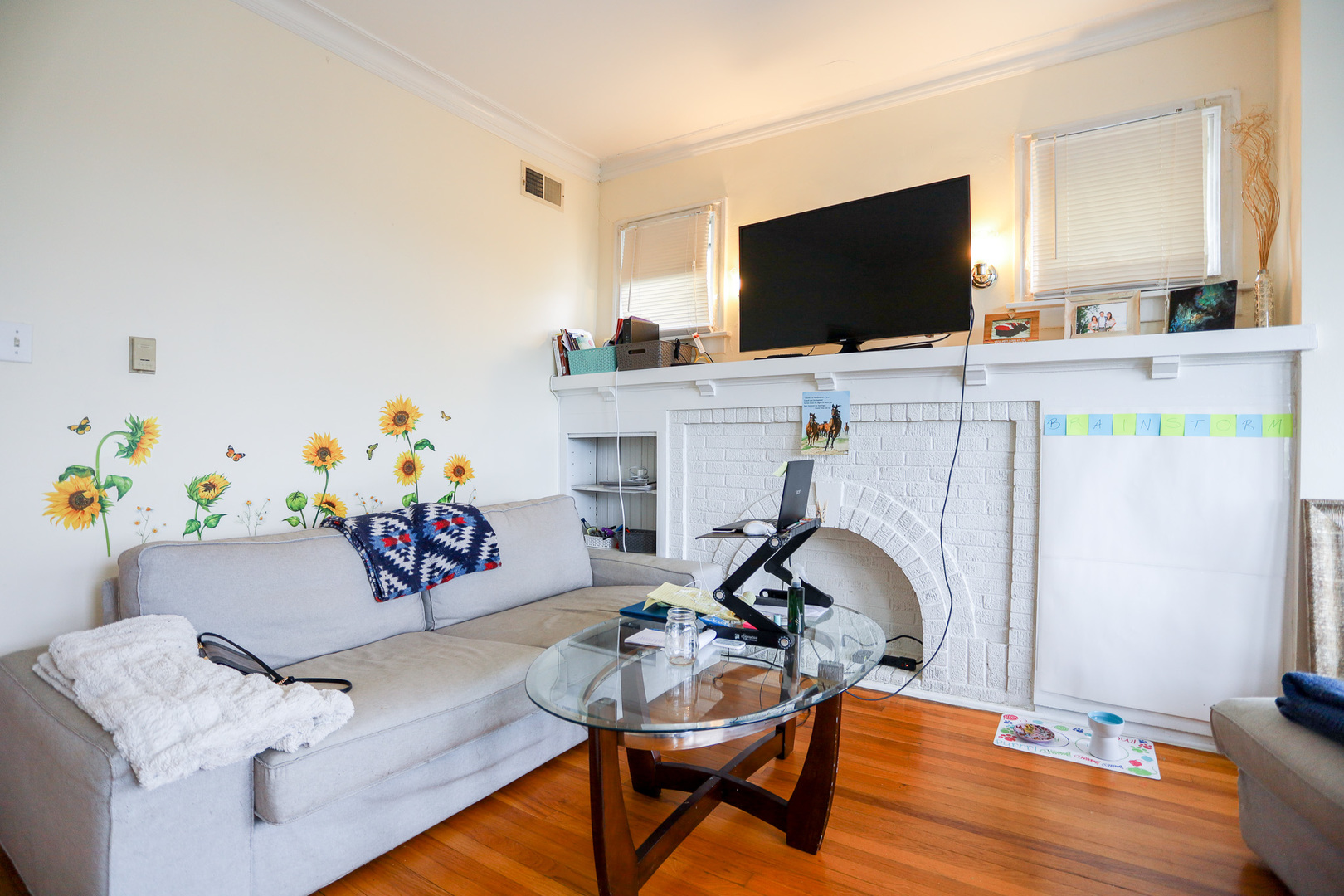 2325 West Addison Street, Unit 3 Chicago, IL 60618 - Photo 10 of 12 a view of a workspace with furniture and wooden floor