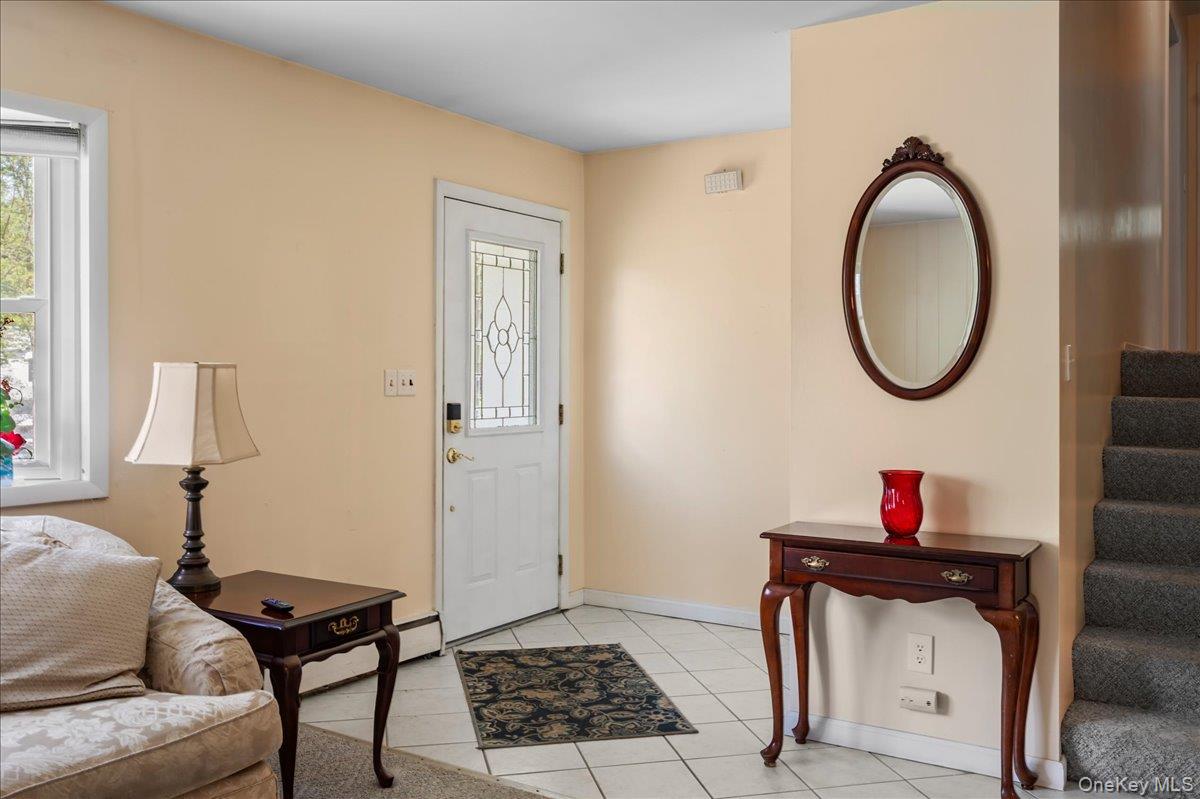 147 Lockwood Road Cortlandt Manor, NY 10567 - Photo 2 of 31 a bathroom with a toilet and a mirror