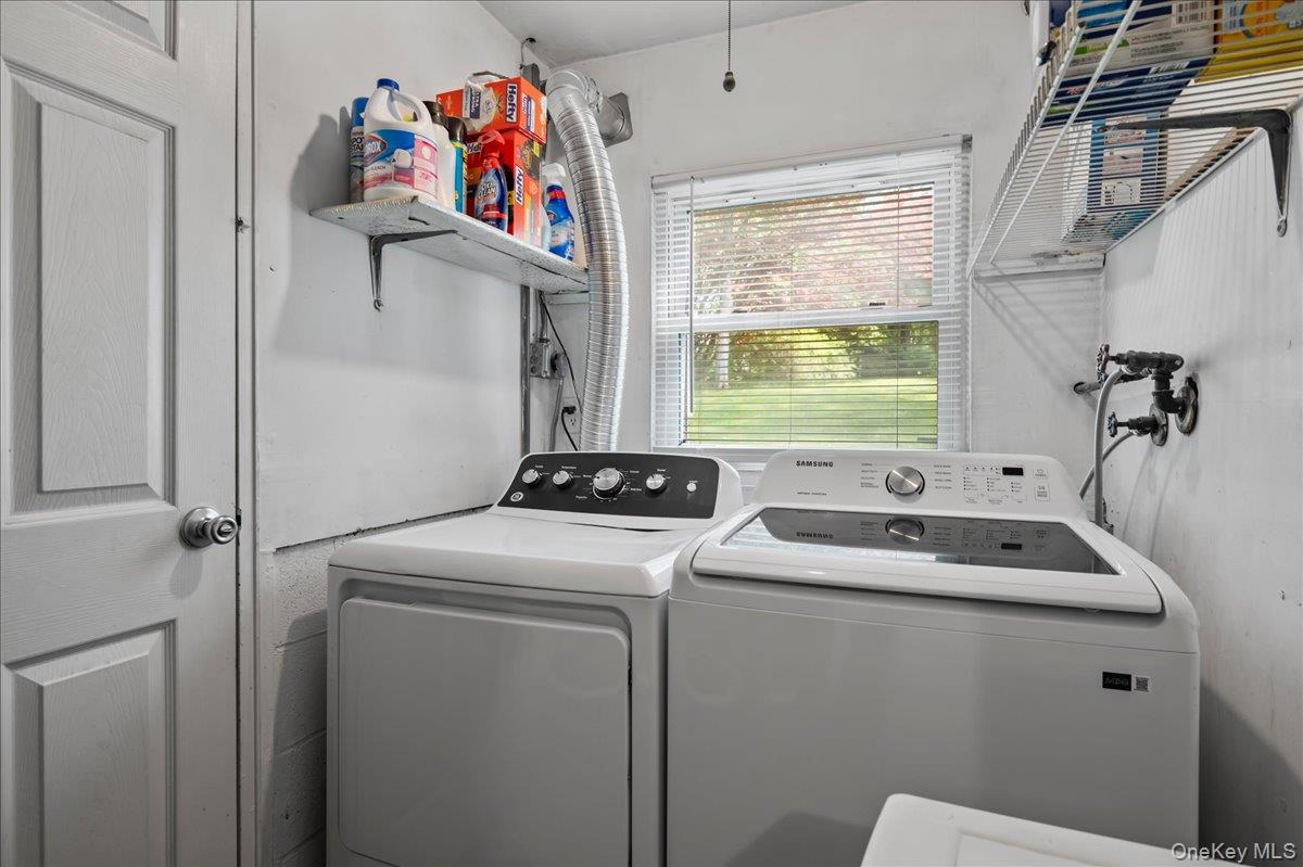 147 Lockwood Road Cortlandt Manor, NY 10567 - Photo 22 of 31 a utility room with dryer and washer