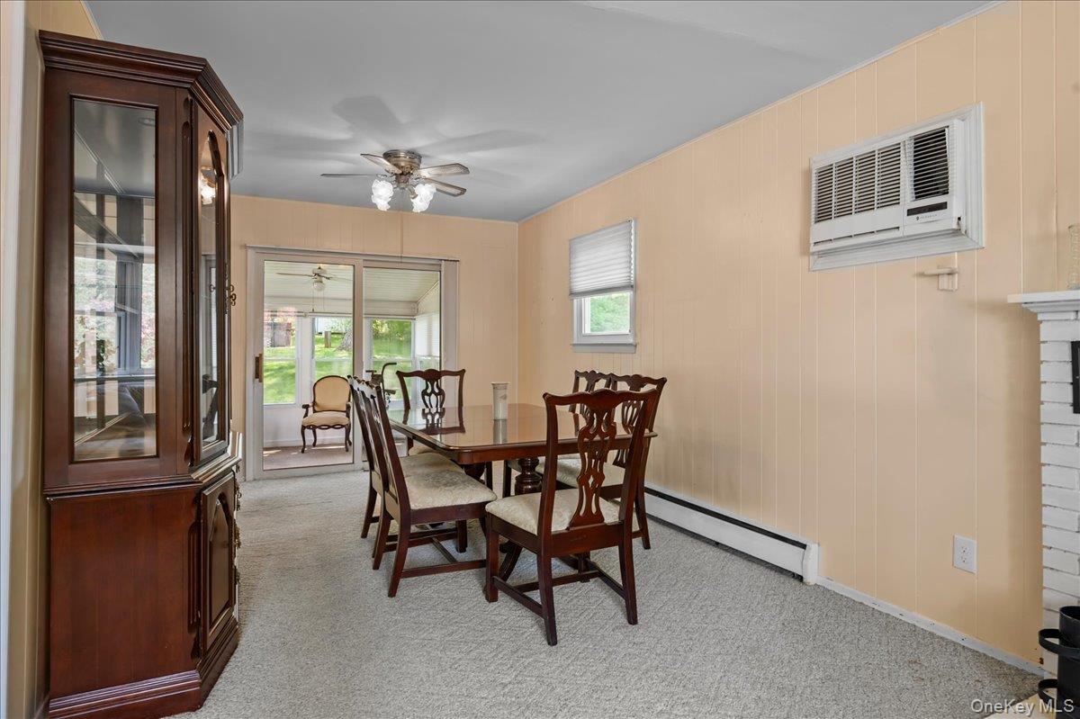 147 Lockwood Road Cortlandt Manor, NY 10567 - Photo 8 of 31 a dining room with furniture and window