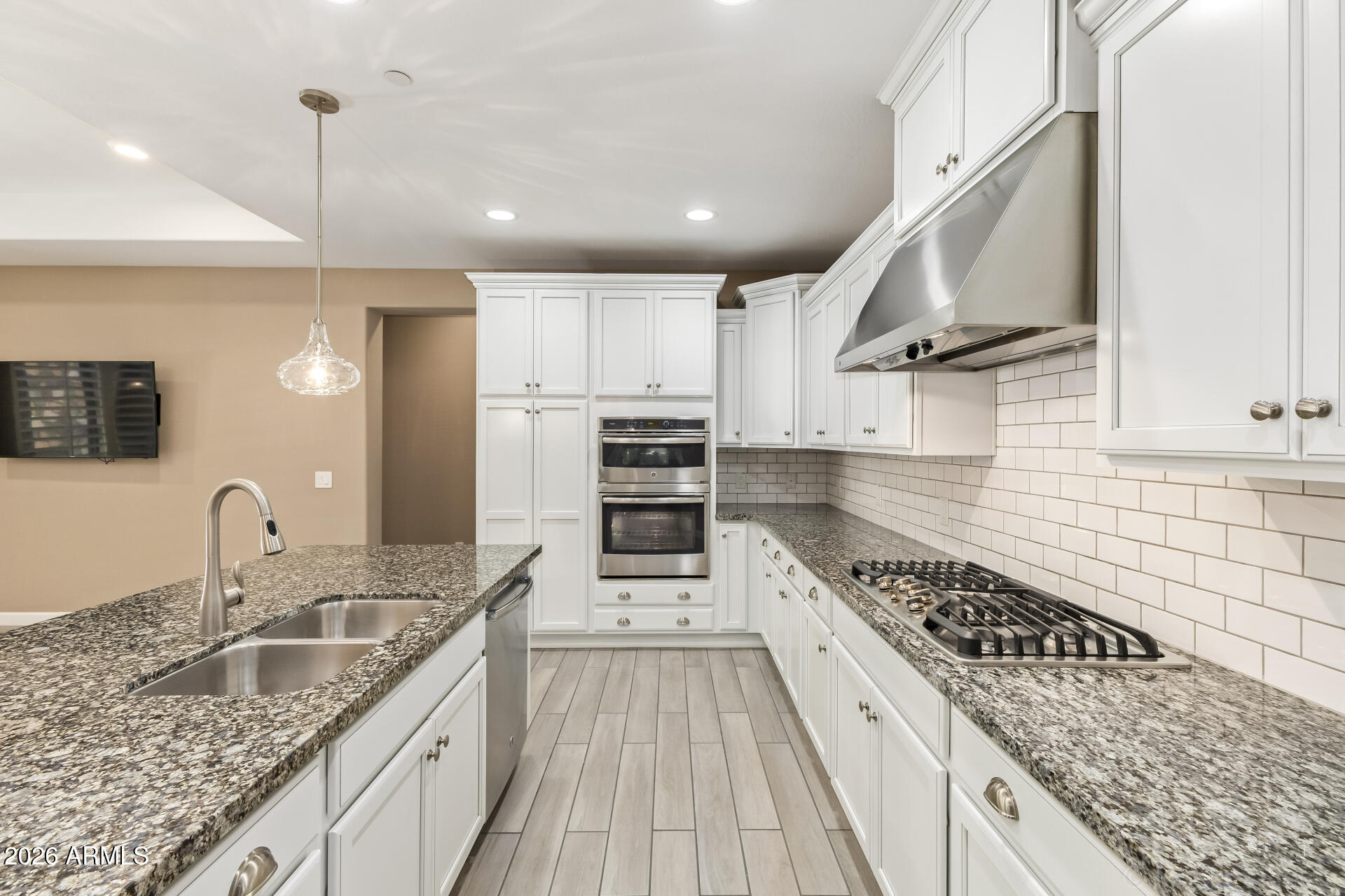 4777 South Fulton Ranch Boulevard, Unit 1068 Chandler, AZ 85248 - Photo 18 of 54 Stainless Hood and Gas Cooktop
