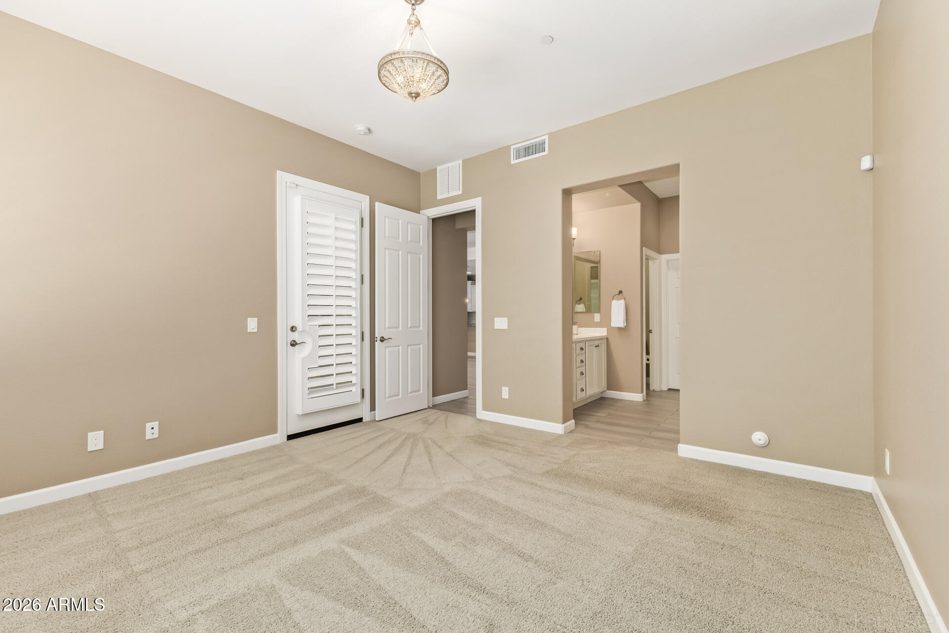 4777 South Fulton Ranch Boulevard, Unit 1068 Chandler, AZ 85248 - Photo 25 of 54 Primary Suite Patio Exit