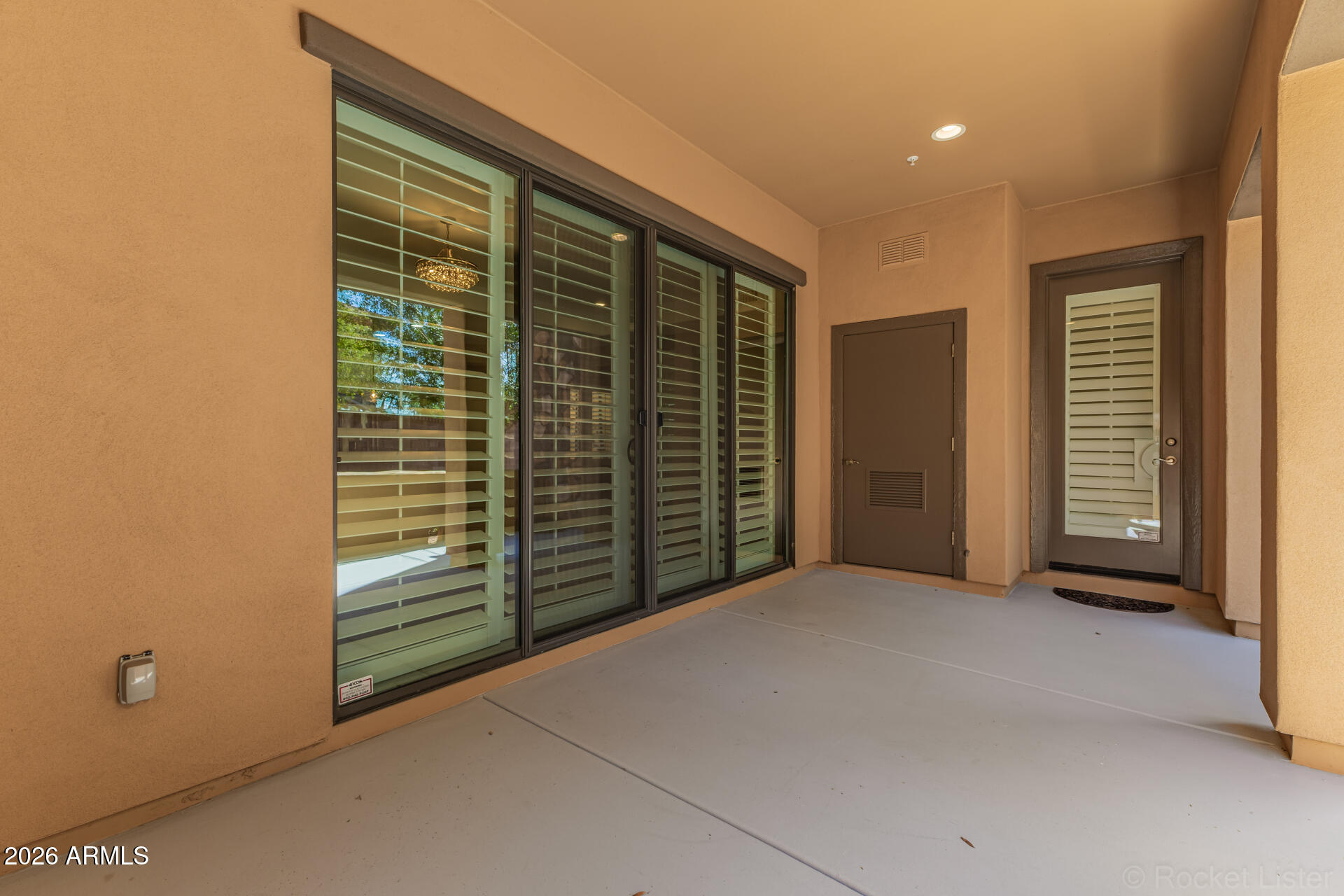 4777 South Fulton Ranch Boulevard, Unit 1068 Chandler, AZ 85248 - Photo 37 of 54 Patio Primary Suite Exit