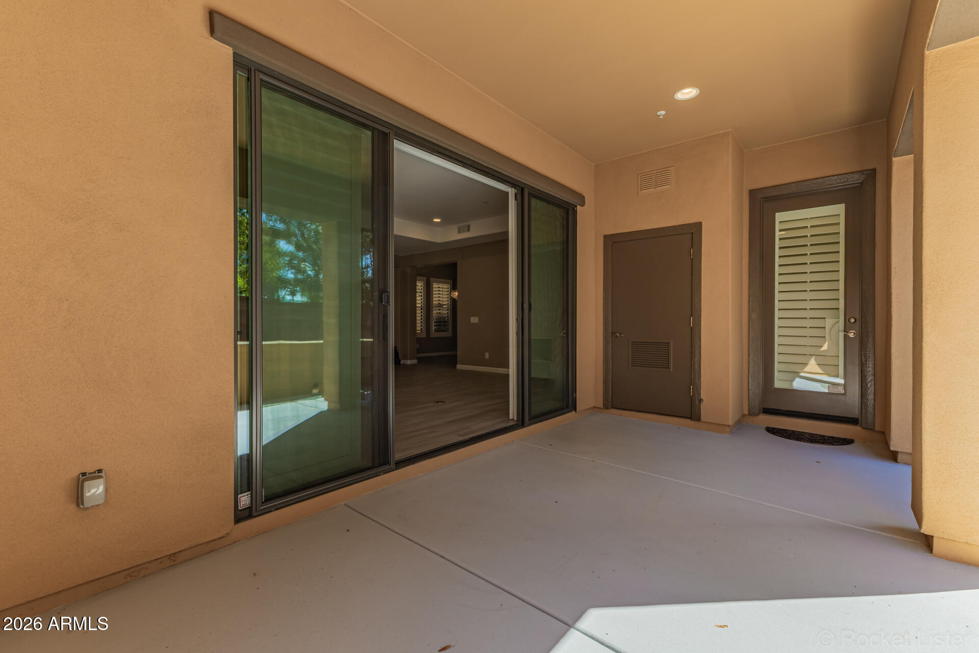 4777 South Fulton Ranch Boulevard, Unit 1068 Chandler, AZ 85248 - Photo 38 of 54 Patio Glass Doors Open