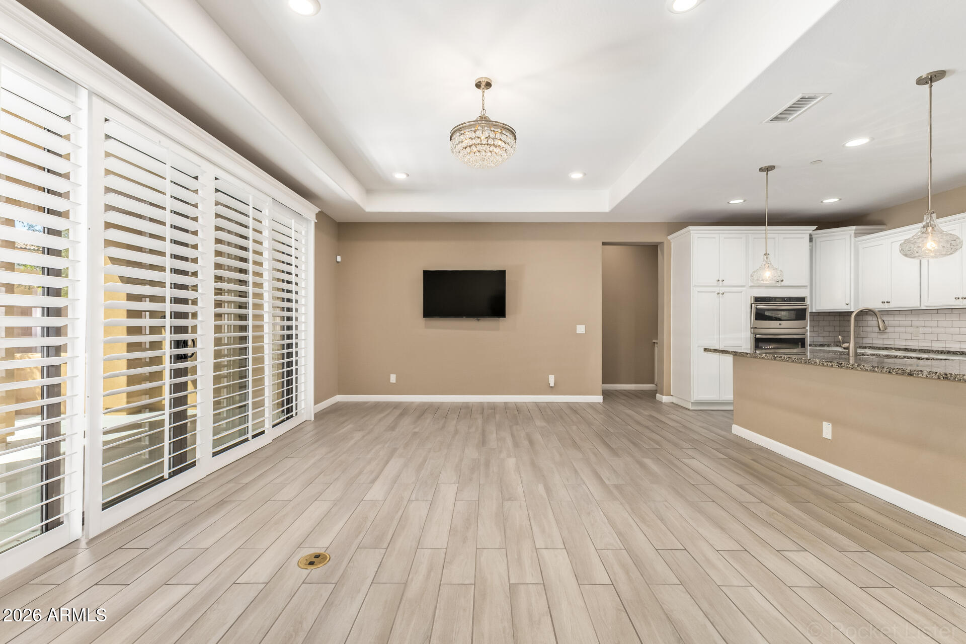 4777 South Fulton Ranch Boulevard, Unit 1068 Chandler, AZ 85248 - Photo 8 of 54 Living Room w/4 Panel Glass Door