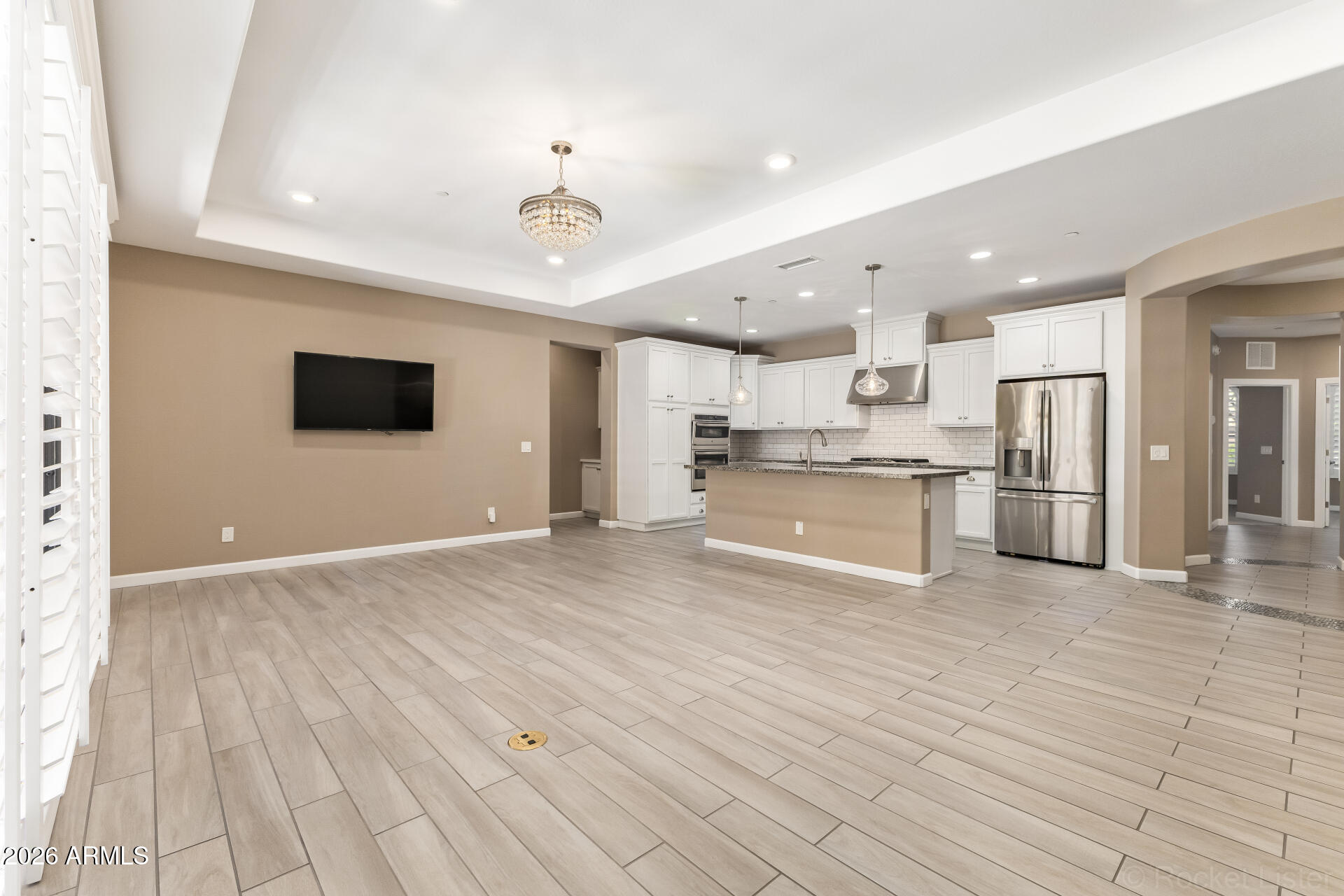 4777 South Fulton Ranch Boulevard, Unit 1068 Chandler, AZ 85248 - Photo 9 of 54 Living Room Towards the Kitchen