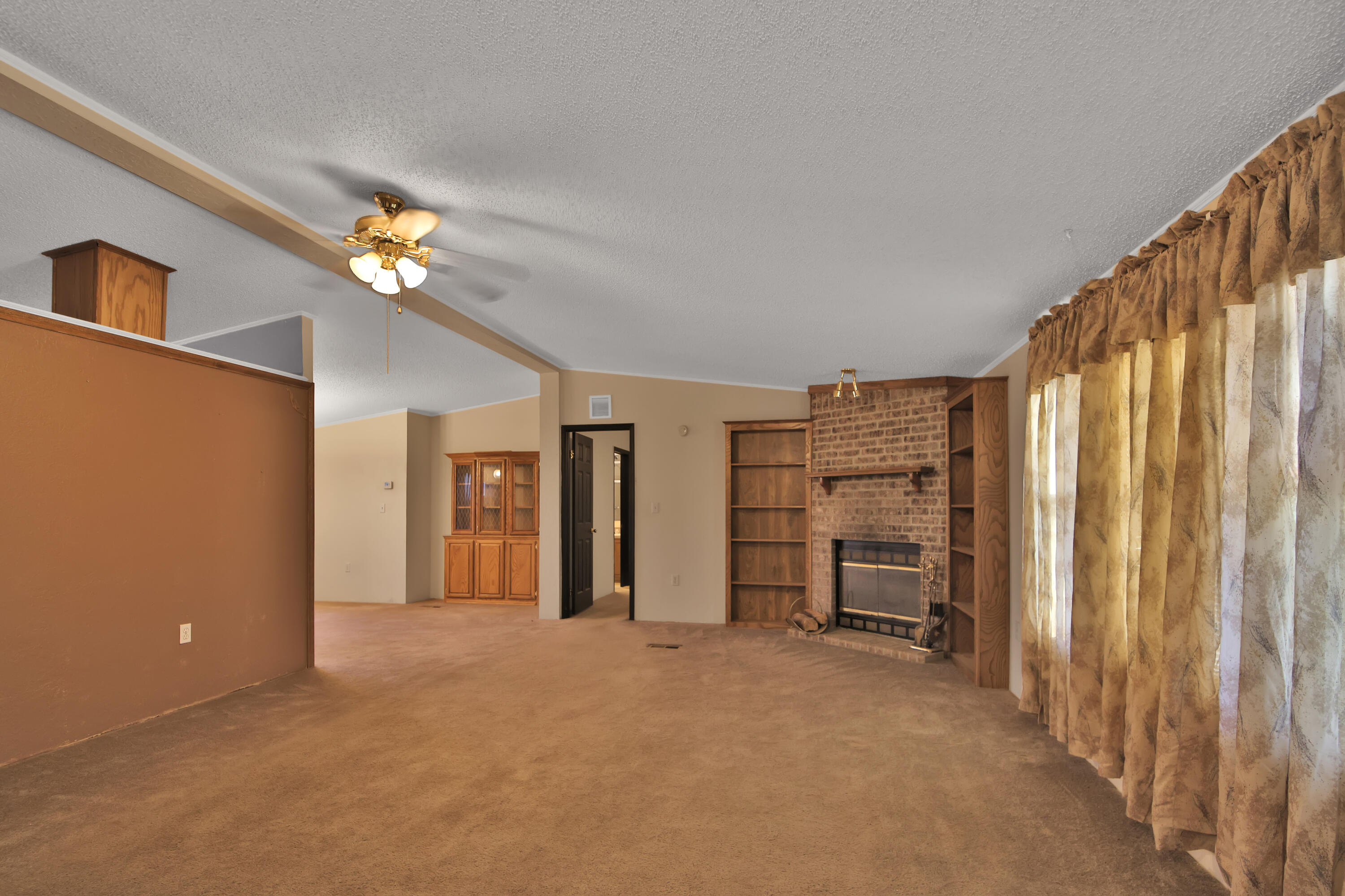120 Highway 114 Estates Road Shallowater, TX 79363 - Photo 28 of 49 an empty room with windows and closet