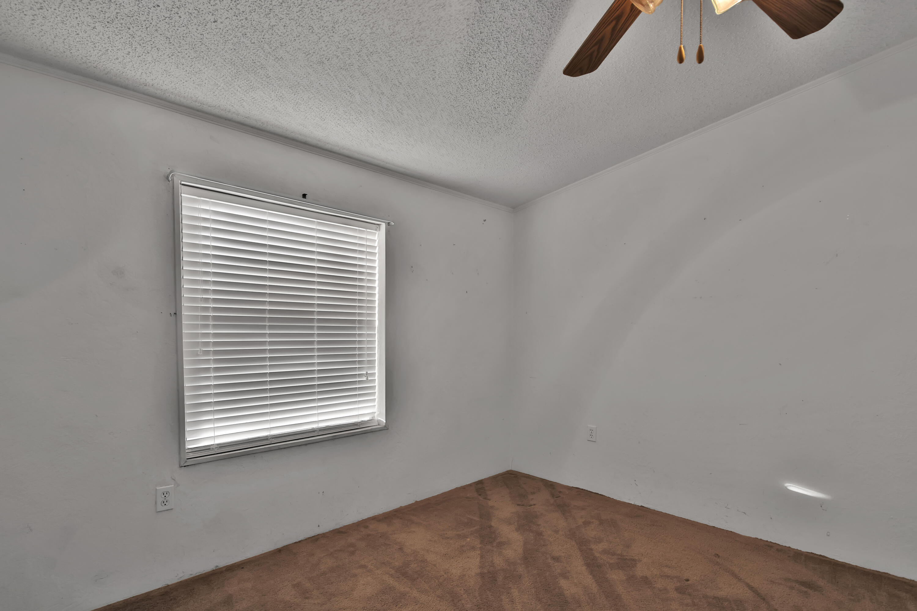 120 Highway 114 Estates Road Shallowater, TX 79363 - Photo 29 of 49 an empty room with a window