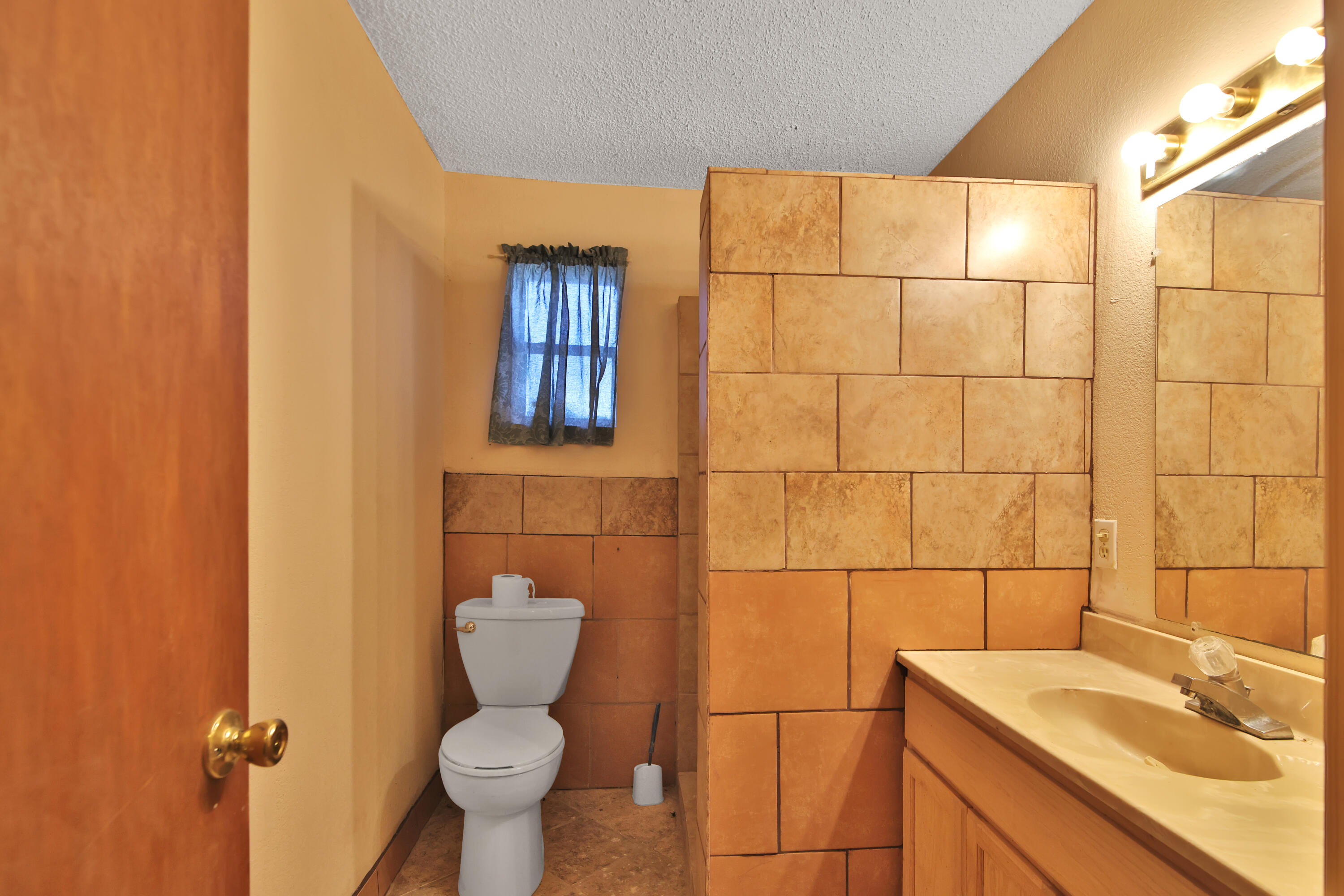 120 Highway 114 Estates Road Shallowater, TX 79363 - Photo 38 of 49 a bathroom with a sink toilet and shower