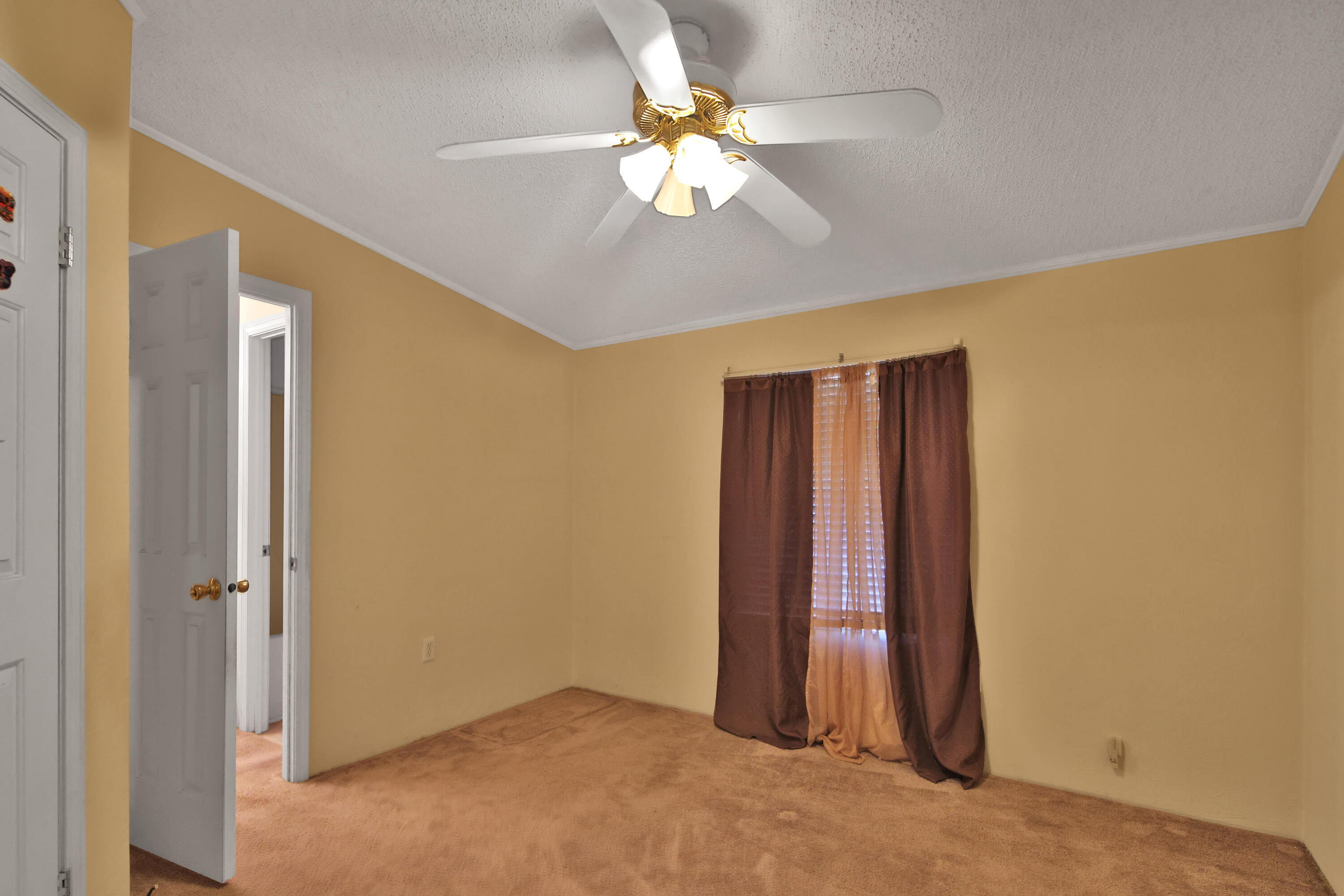 120 Highway 114 Estates Road Shallowater, TX 79363 - Photo 6 of 49 a view of an empty room with a window