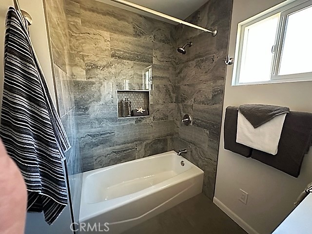 3717 Cherry Long Beach, CA 90807 - Photo 17 of 34 a bathroom with a bathtub and a shower