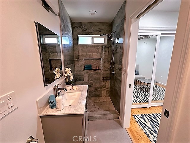 3717 Cherry Long Beach, CA 90807 - Photo 22 of 34 a bathroom with a sink a toilet and shower