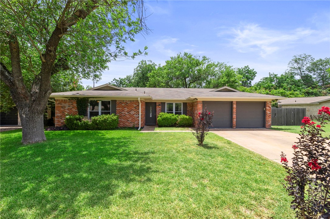 7402 Bucknell Drive Austin, TX 78723 - Photo 1 of 1 a house view with a garden space