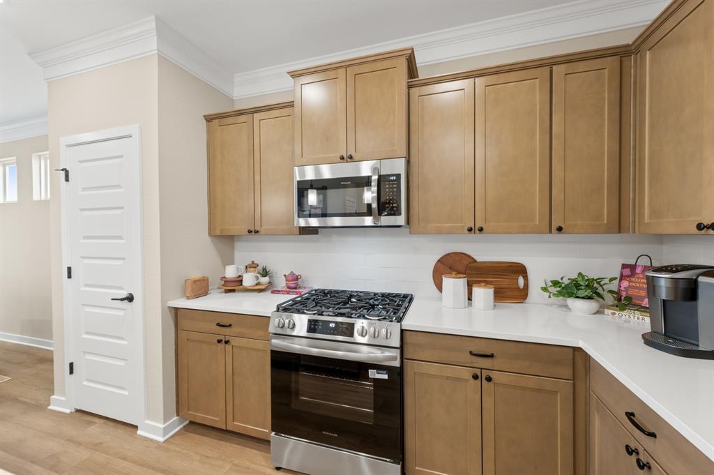 4328 Brayfield Road Fort Worth, TX 76036 - Photo 8 of 26 The Oakshire II- Kitchen with Ample Cabinet and Countertop Space