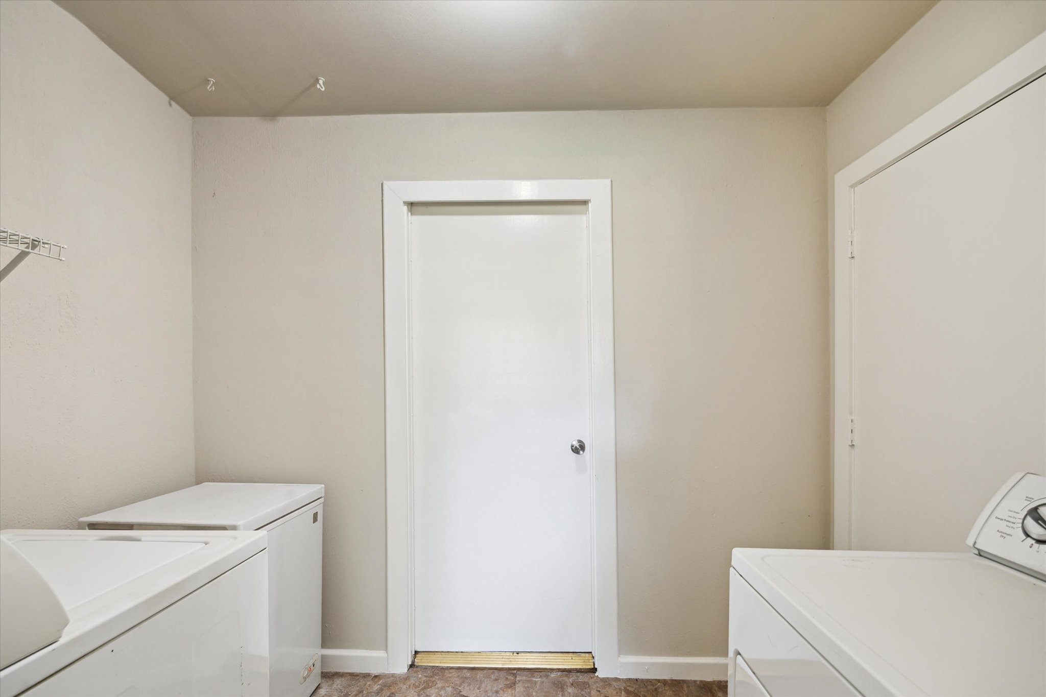 4226 Mossygate Drive Spring, TX 77373 - Photo 15 of 16 Laundry Room
Dedicated indoor laundry room with extra space for storage or additional appliances.
