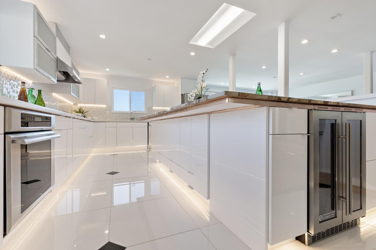22 Bertocchi Lane Millbrae, CA 94030 - Photo 12 of 50 a kitchen with stainless steel appliances granite countertop a refrigerator and a sink