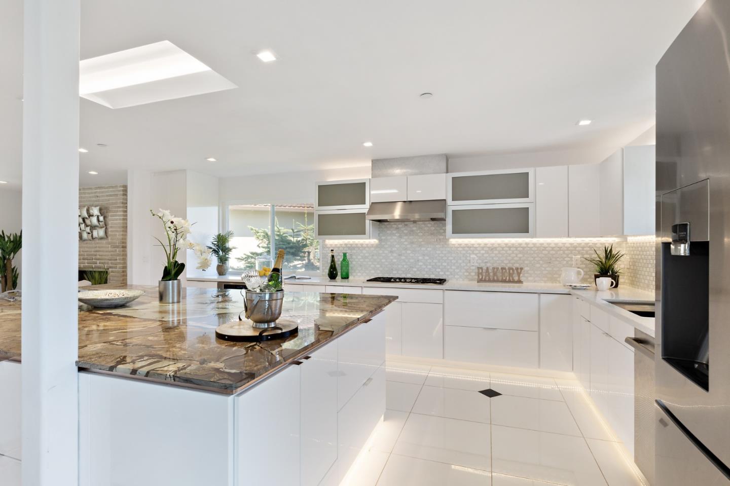 22 Bertocchi Lane Millbrae, CA 94030 - Photo 15 of 50 a kitchen with counter top space cabinets and appliances