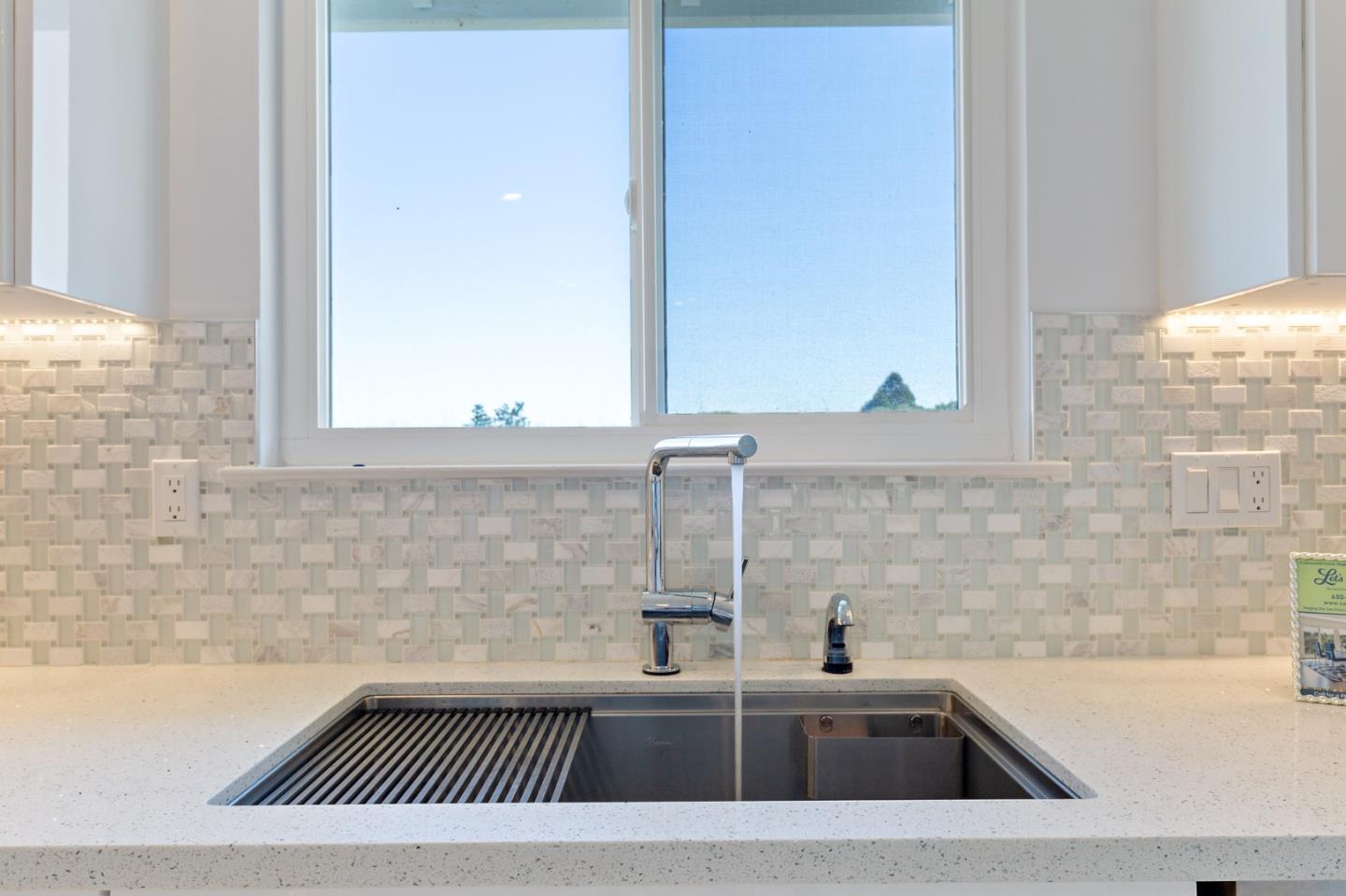 22 Bertocchi Lane Millbrae, CA 94030 - Photo 17 of 50 a bathroom with a sink and a mirror