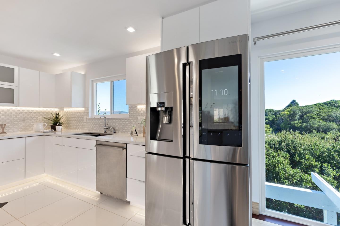 22 Bertocchi Lane Millbrae, CA 94030 - Photo 18 of 50 a kitchen with stainless steel appliances a refrigerator and a sink