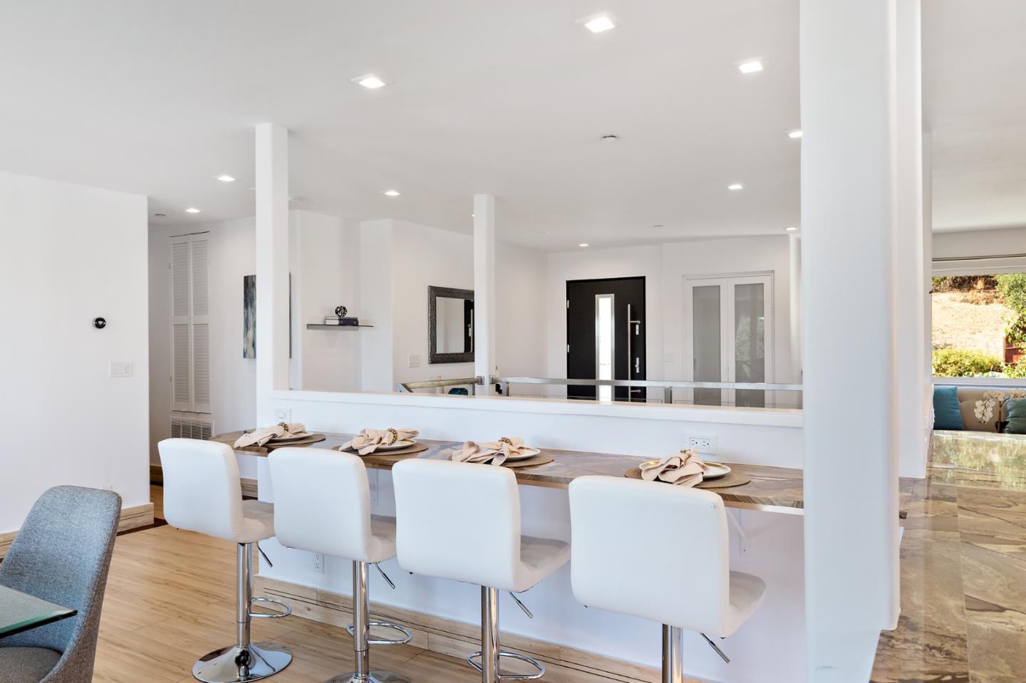 22 Bertocchi Lane Millbrae, CA 94030 - Photo 22 of 50 a dining hall with stainless steel appliances granite countertop a dining table and chairs