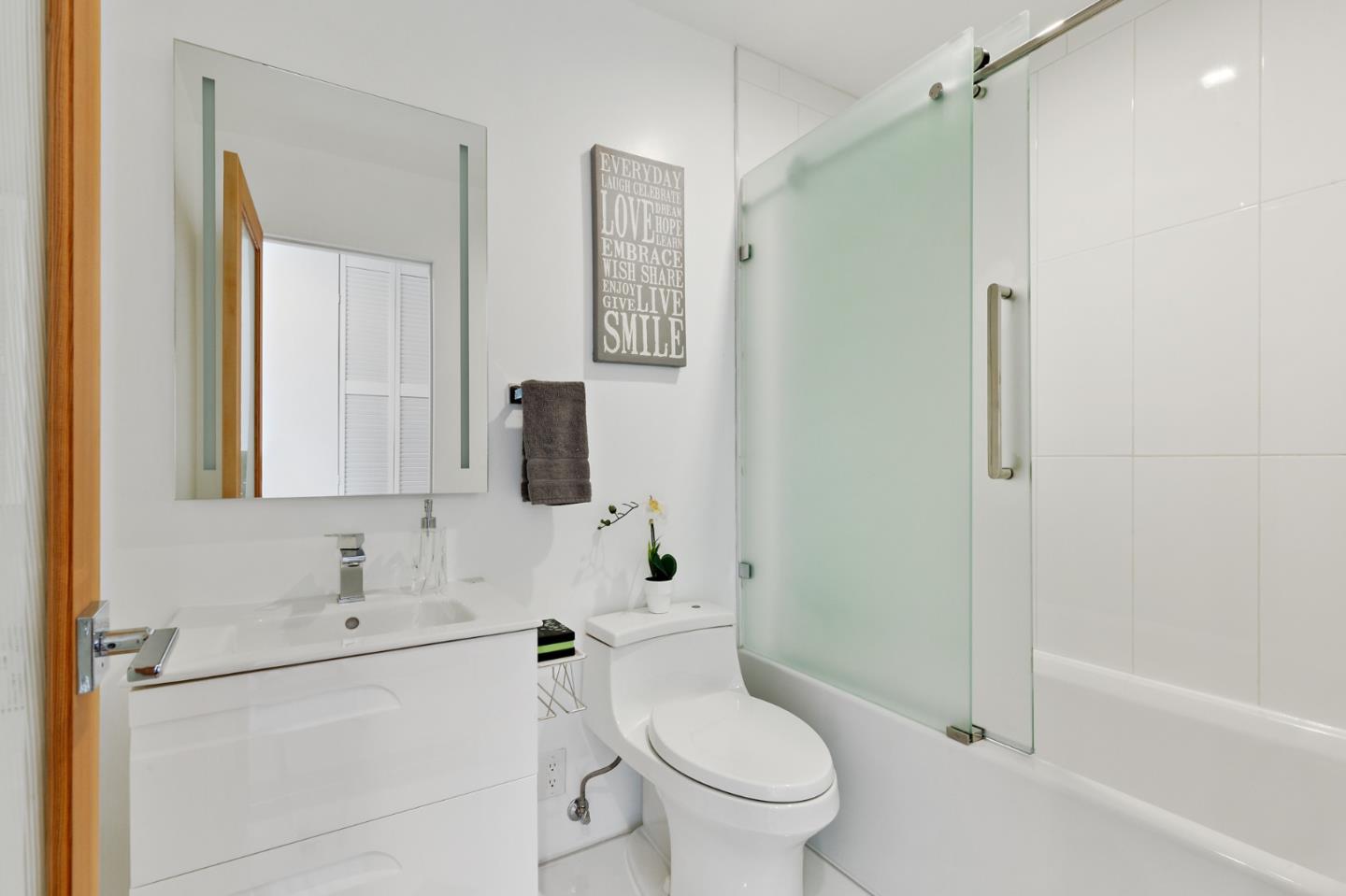 22 Bertocchi Lane Millbrae, CA 94030 - Photo 23 of 50 a bathroom with a sink toilet and shower