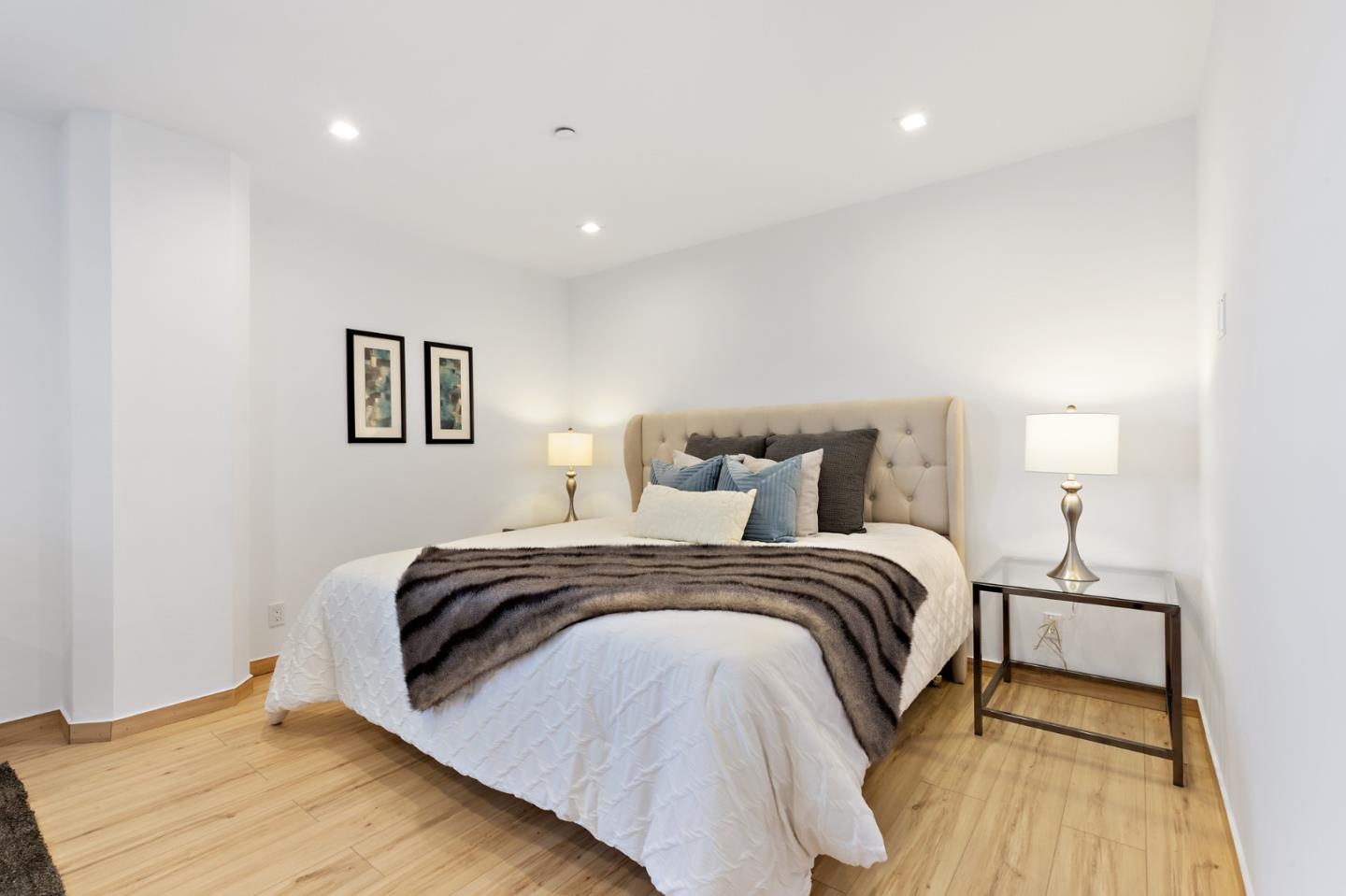 22 Bertocchi Lane Millbrae, CA 94030 - Photo 29 of 50 a bed room with a bed and a night lamp