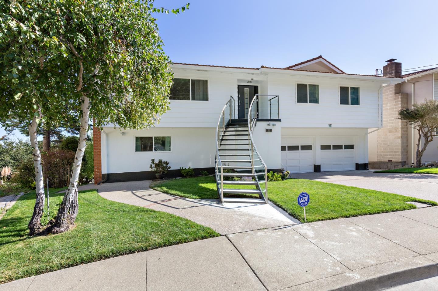 22 Bertocchi Lane Millbrae, CA 94030 - Photo 3 of 50 a house with trees in the background