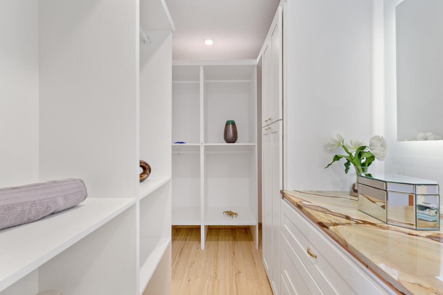 22 Bertocchi Lane Millbrae, CA 94030 - Photo 34 of 50 a spacious bathroom with a granite countertop sink and a mirror