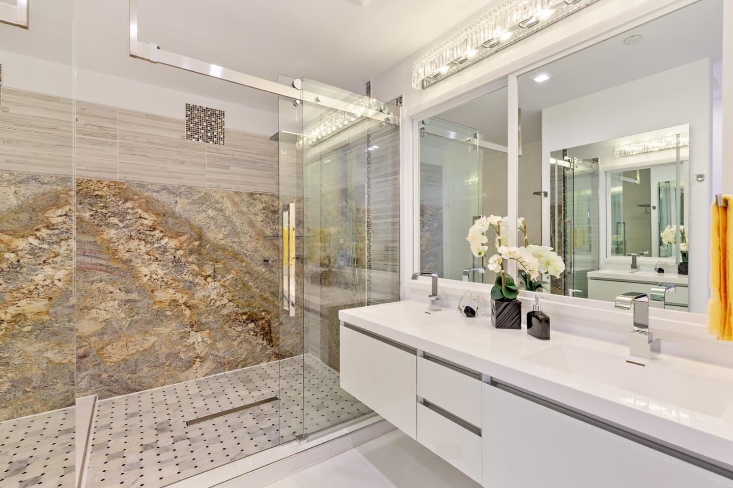 22 Bertocchi Lane Millbrae, CA 94030 - Photo 37 of 50 a bathroom with a double vanity sink mirror and shower