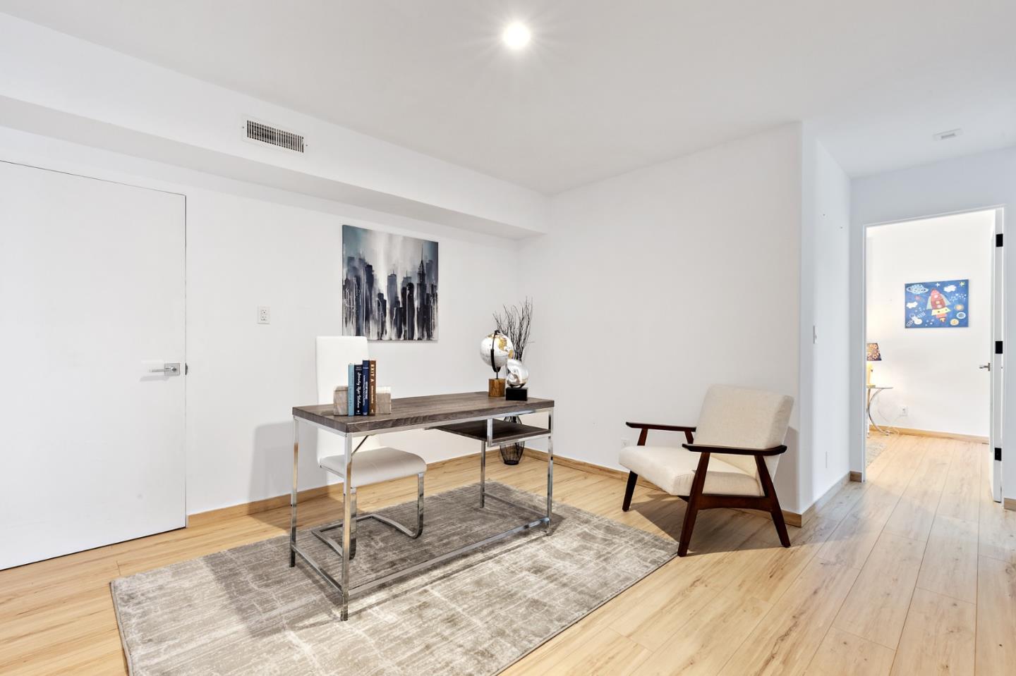 22 Bertocchi Lane Millbrae, CA 94030 - Photo 44 of 50 a workspace with furniture and wooden floor