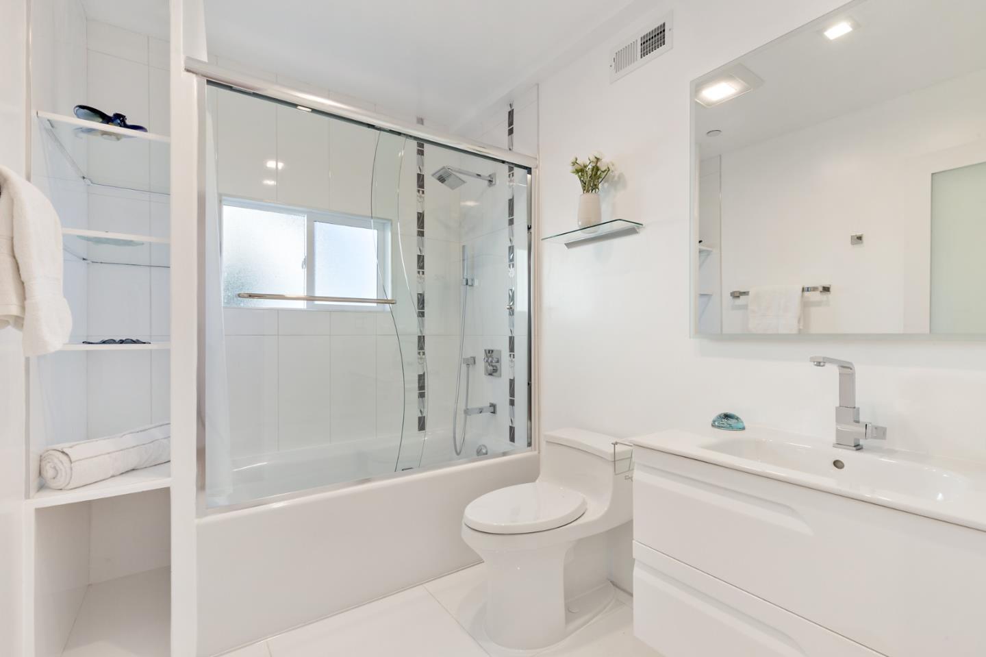 22 Bertocchi Lane Millbrae, CA 94030 - Photo 48 of 50 a bathroom with a sink a toilet and shower