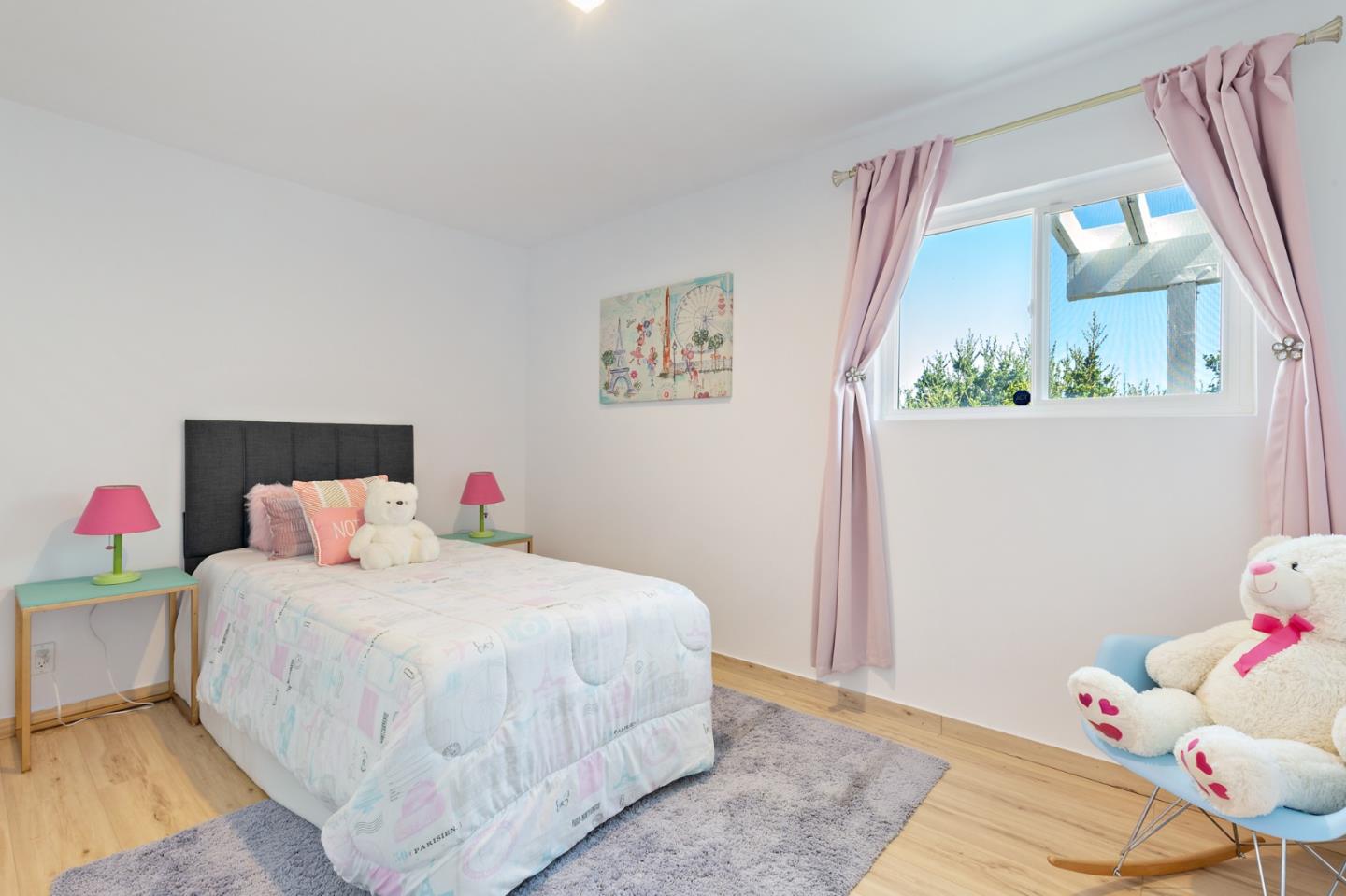 22 Bertocchi Lane Millbrae, CA 94030 - Photo 49 of 50 a bedroom with a bed and a window